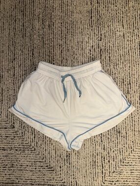 Princess Polly White Athletic Shorts with Light Blue Trim